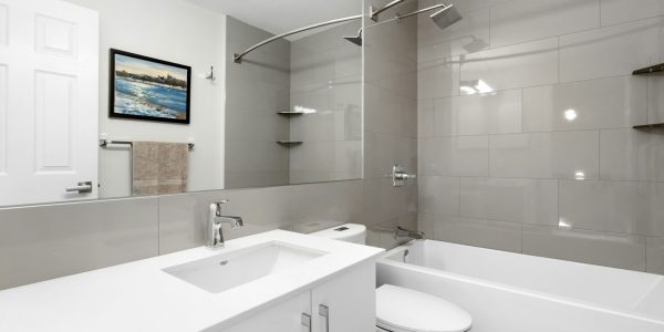 Accessible bathroom with curbless shower design in San Antonio remodel