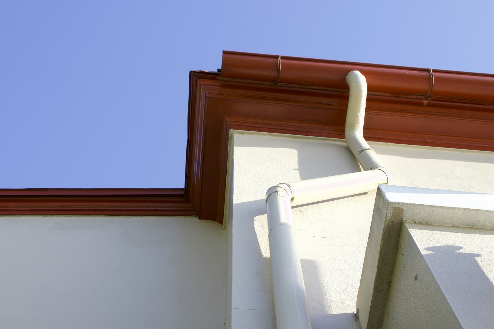 Foundation Drainage San Antonio Feature Home gutter and drainage system on a San Antonio house