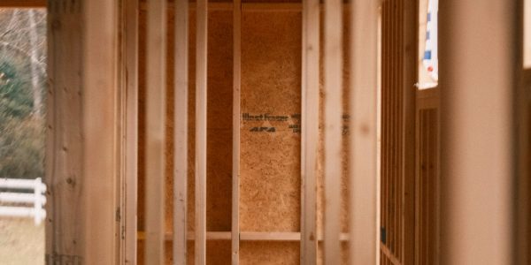 Home addition under construction with wood framing in San Antonio