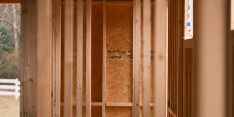 Home addition under construction with wood framing in San Antonio