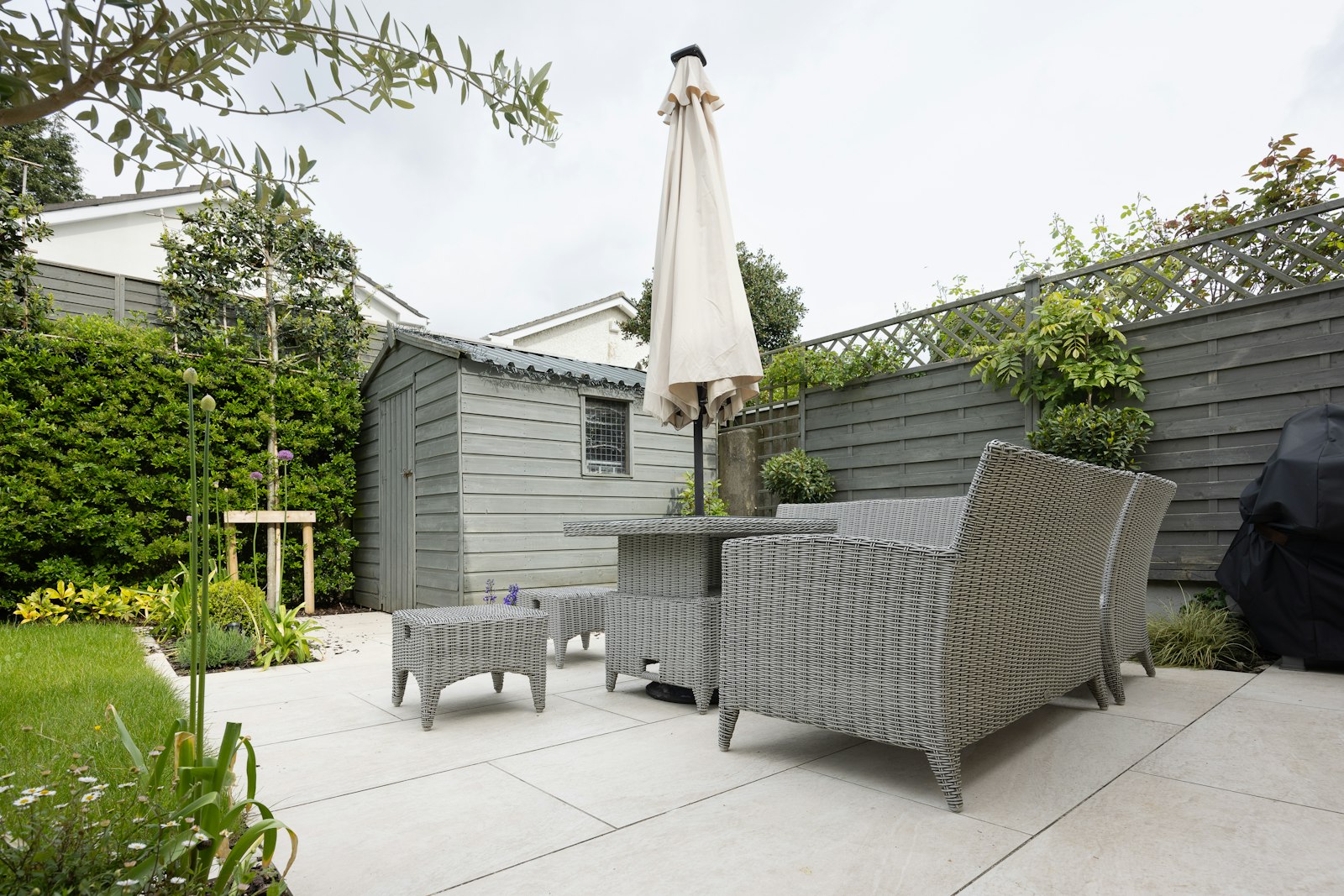 Outdoor Living Space Remodel San Antonio Covered patio and outdoor living space remodel in San Antonio with table and seating