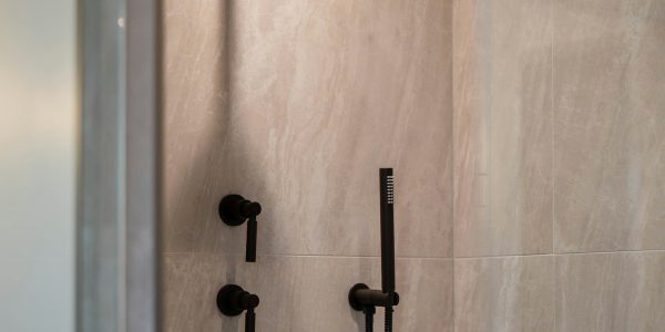 Modern tiled walk-in shower representing a completed San Antonio bathroom remodel