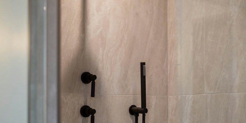Modern tiled walk-in shower representing a completed San Antonio bathroom remodel