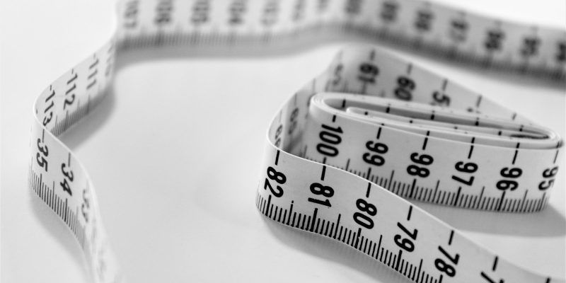 Tape measure representing careful planning to avoid common remodeling mistakes in San Antonio