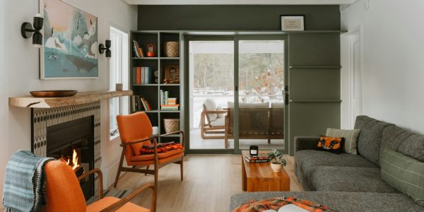 Cozy living room with fireplace ready for cool-weather use in a San Antonio home