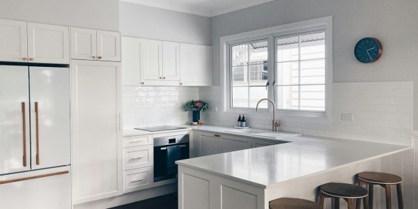 Finished white kitchen cabinetry representing a completed San Antonio kitchen remodel